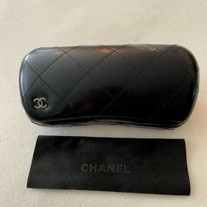 Chanel quilted sunglass case. Never used. Case and box only. No Sunglasses.
